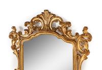 A Baroque Style Giltwood Mirror