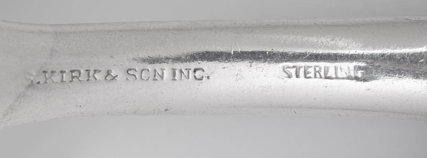 A Gorham Cluny Silver Flatware Service with S. Kirk and Son Repousse Silver Flatware and Serving Articles