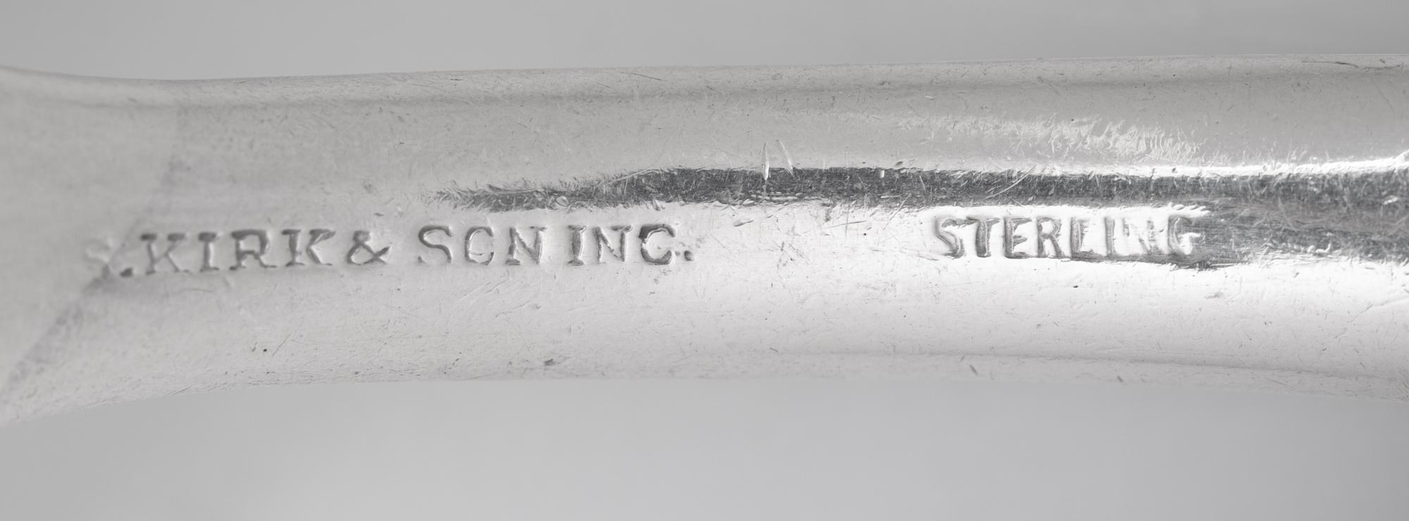 A Gorham Cluny Silver Flatware Service with S. Kirk and Son Repousse Silver Flatware and Serving Articles
