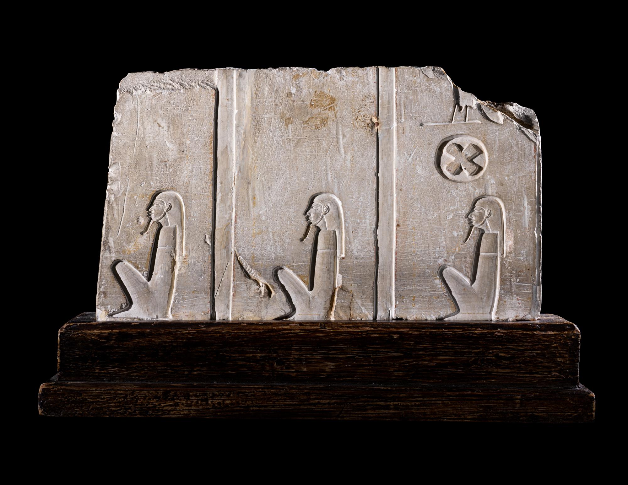 An Egyptian Limestone Relief Fragment