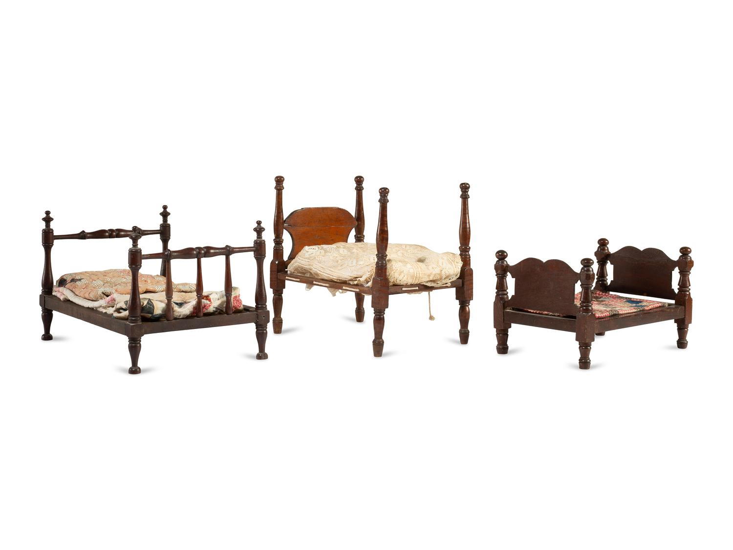 Three Miniature Bedsteads with Quilts