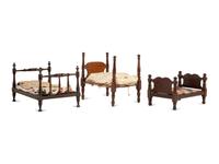 Three Miniature Bedsteads with Quilts