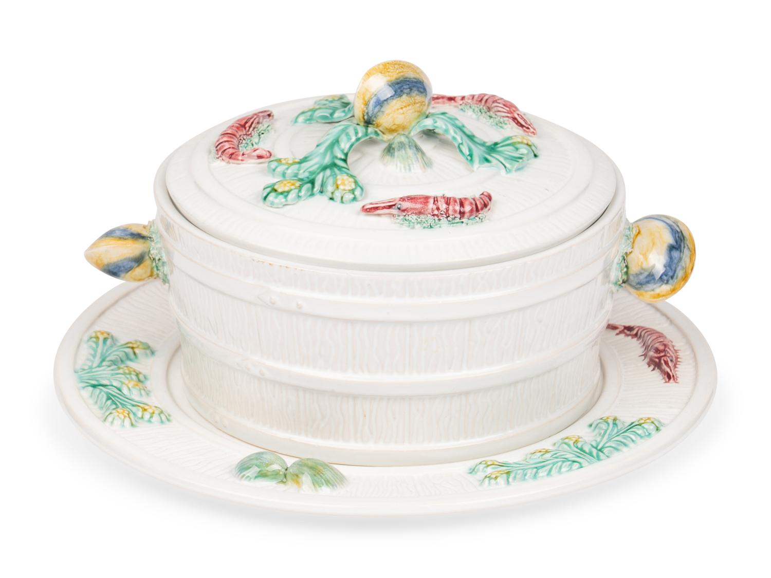 A Mottahedeh Glazed Earthenware Seafood Tureen and Tray