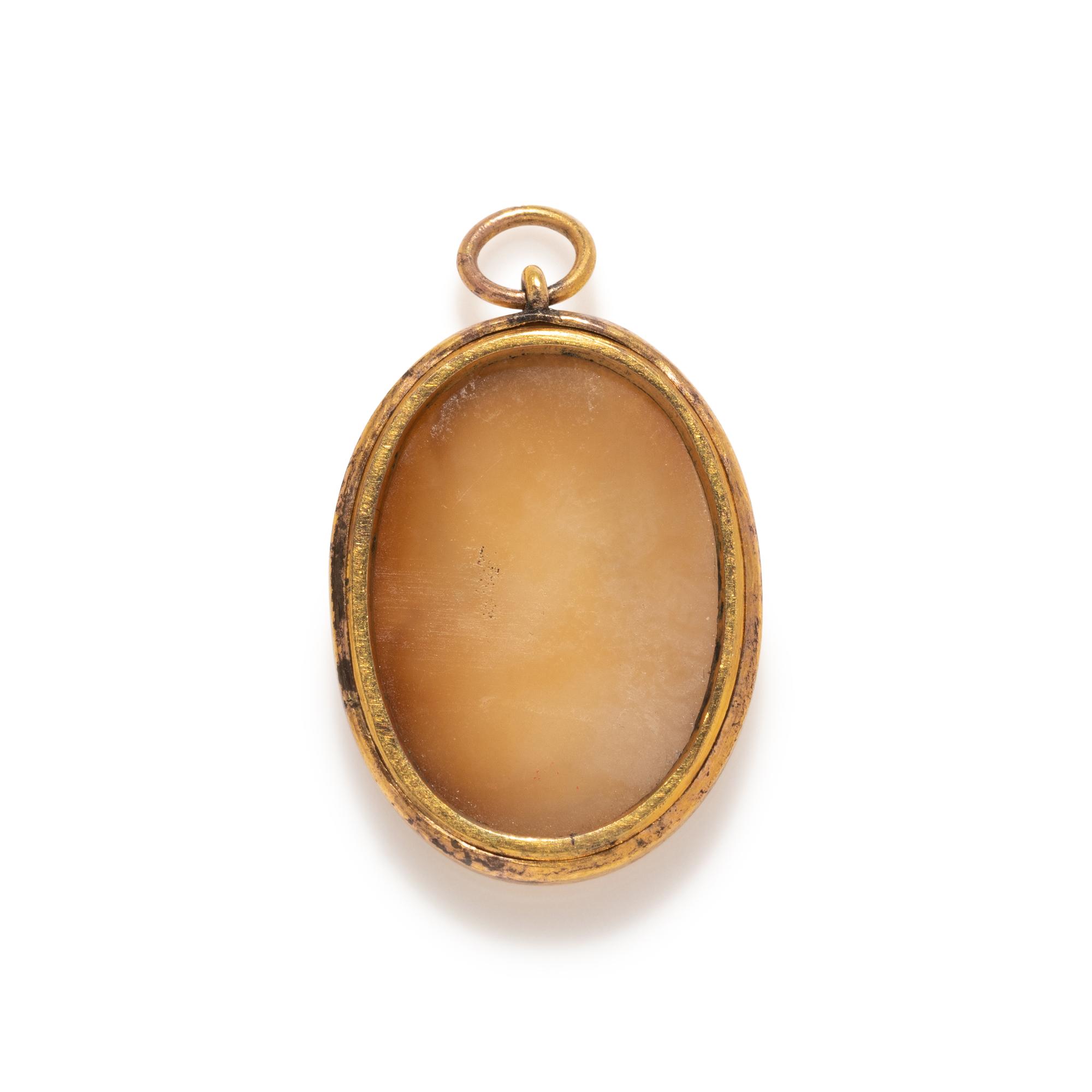 A Neoclassical Gold and Onyx Cameo Pendant with a Bust of Antinous