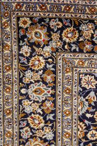 A Kashan Wool Rug