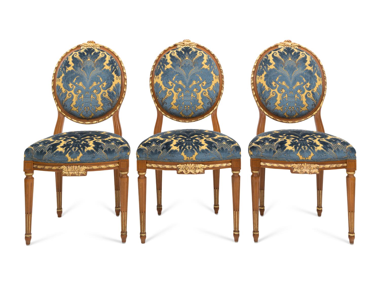 A Set of Three Italian Parcel Gilt Side Chairs