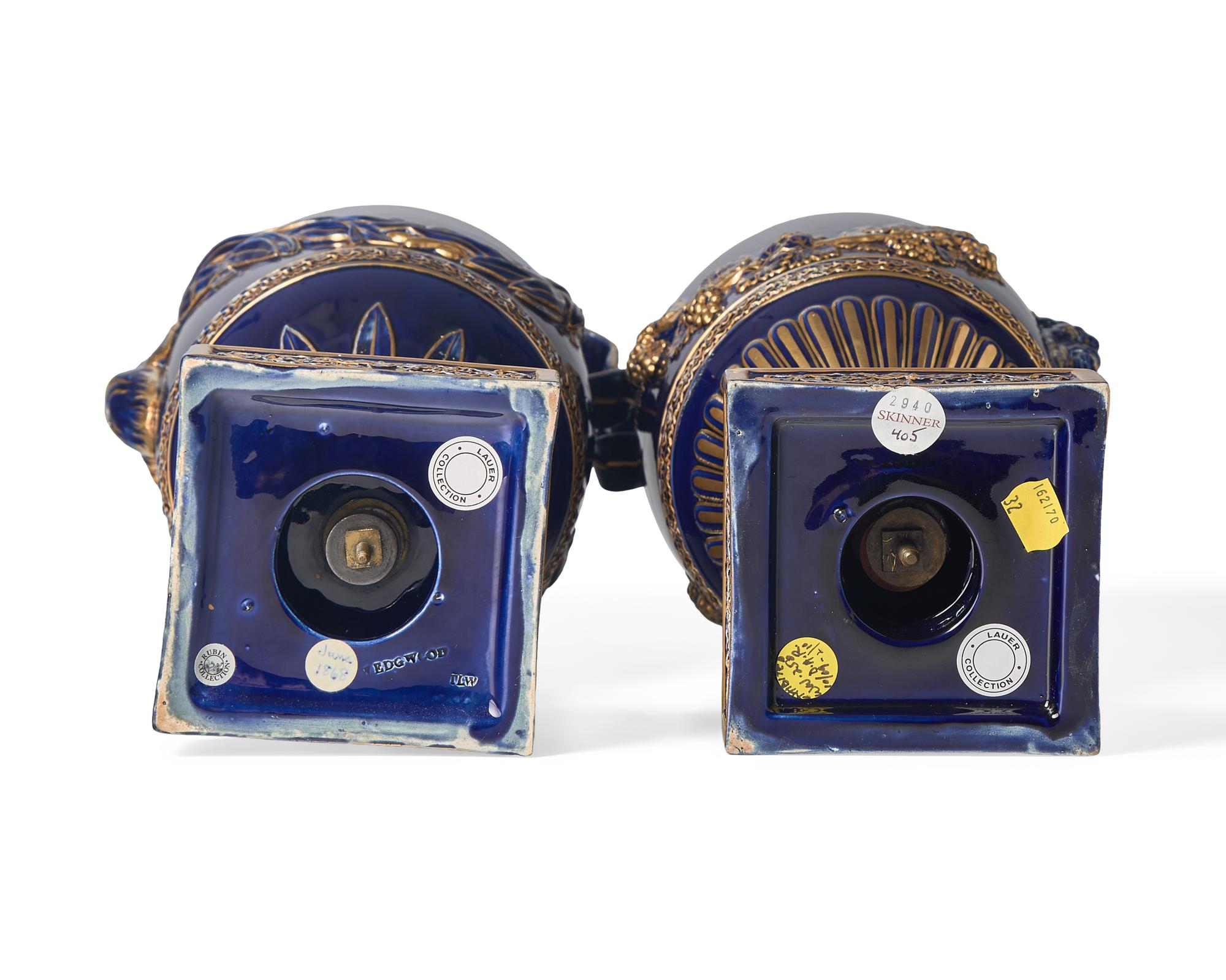 A Pair of Wedgwood Parcel Gilt Cobalt Glazed Ewers