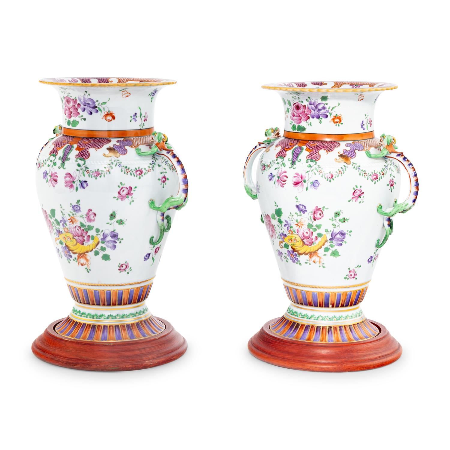 A Pair of Porcelain Urns with Dragon Handles