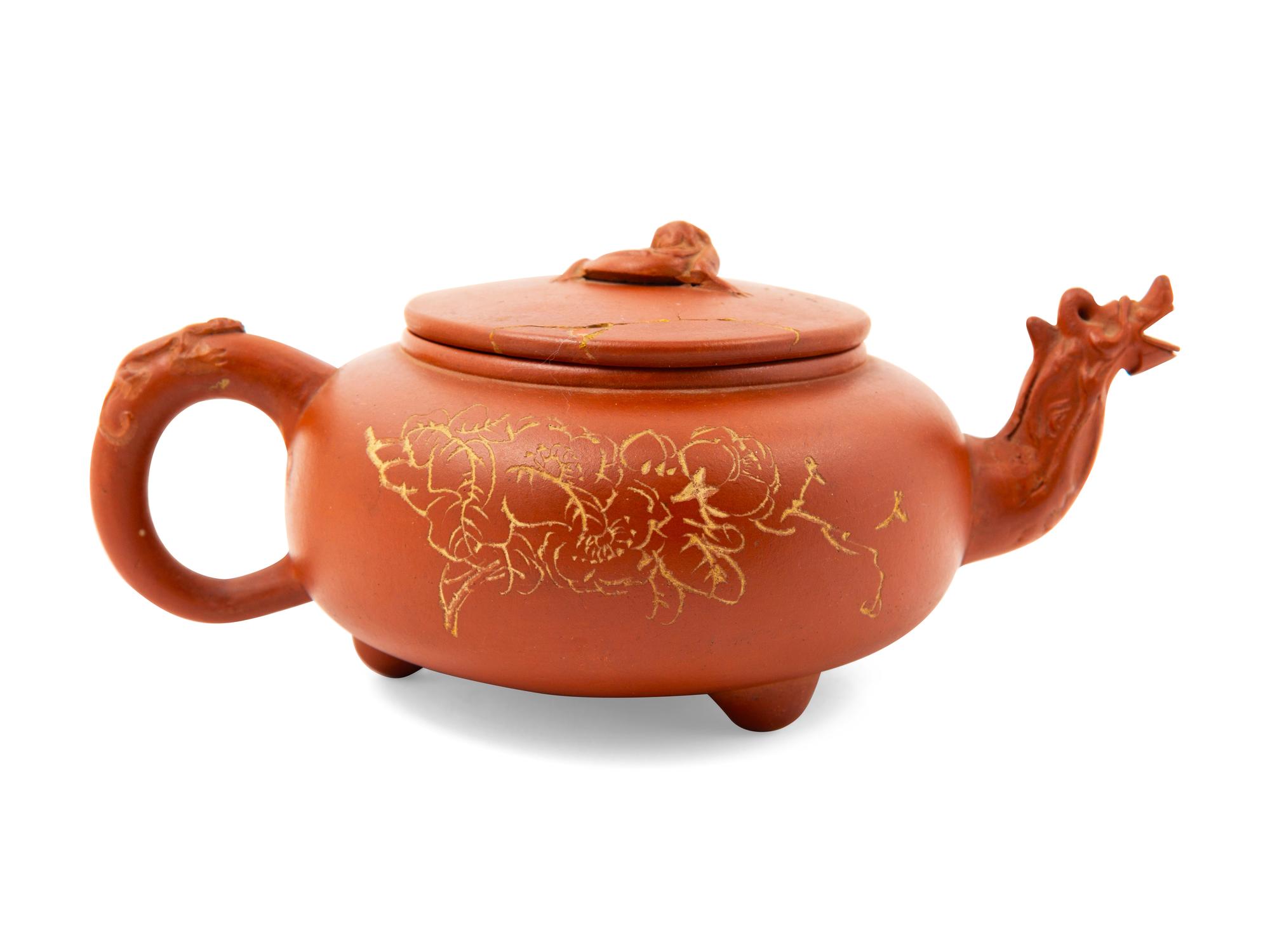A Chinese Yixing Pottery Teapot