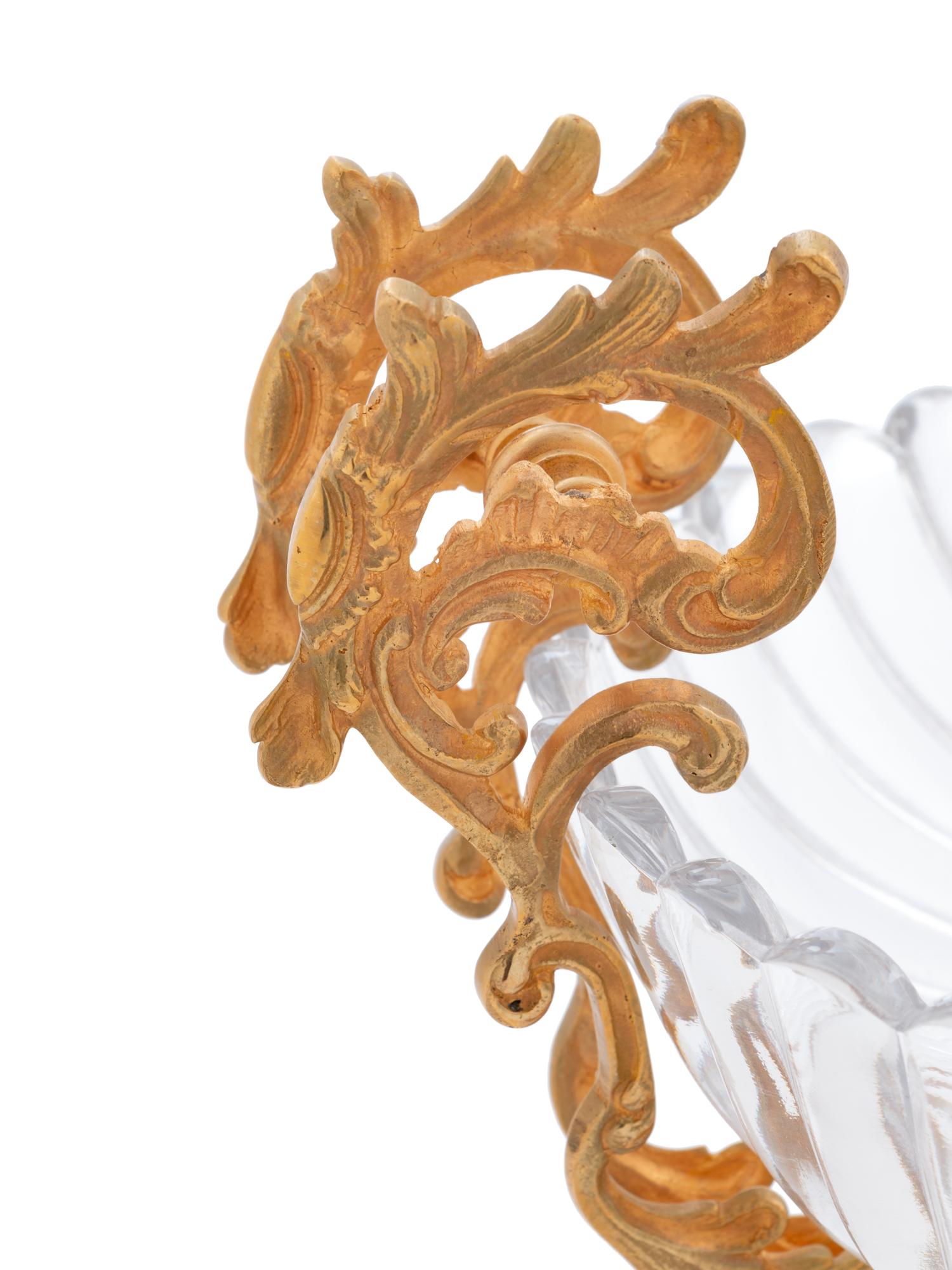 A Louis XV Style Gilt Bronze and Glass Table Garniture