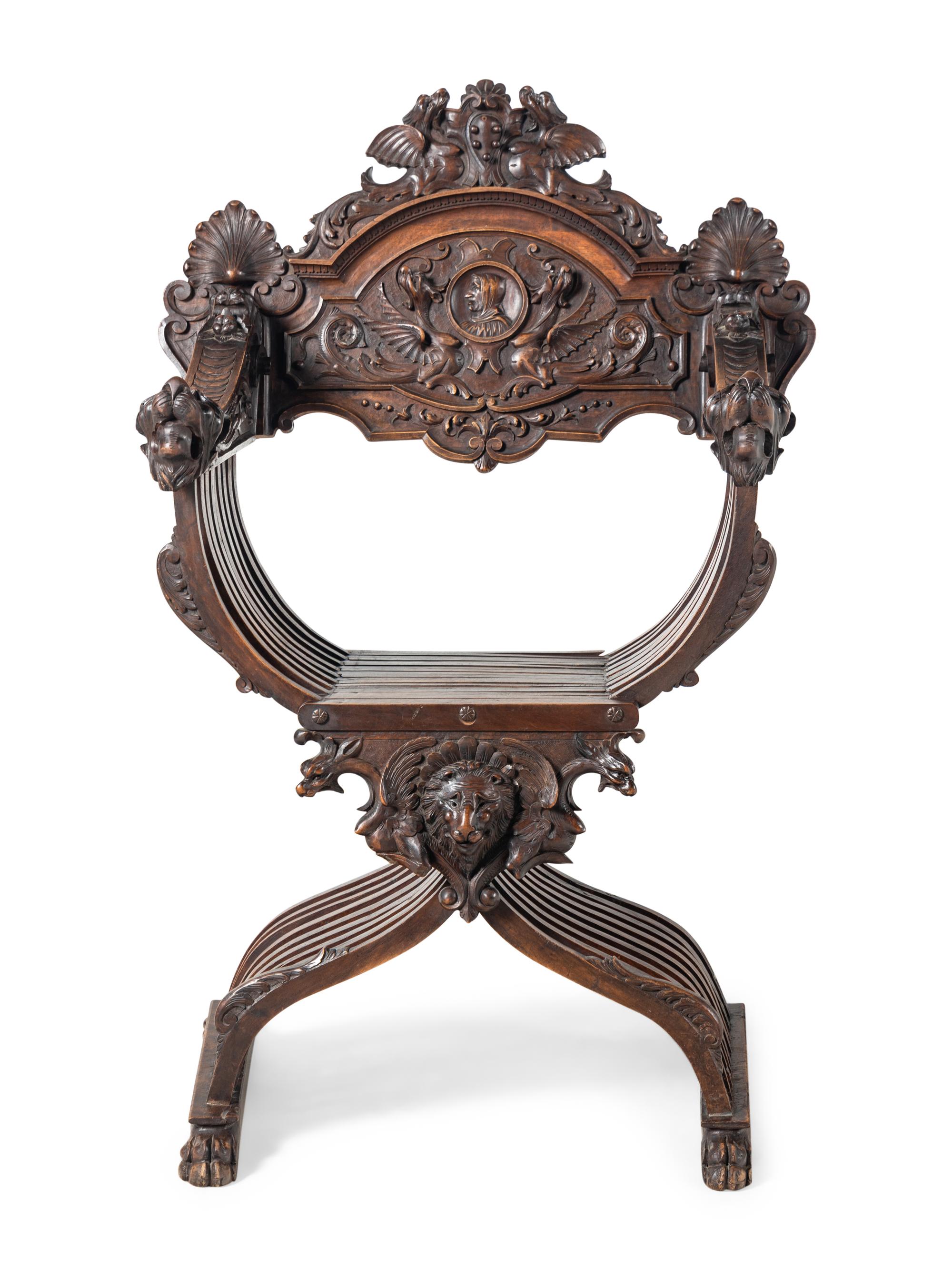 A Renaissance Revival Carved Walnut Savonarola Chair