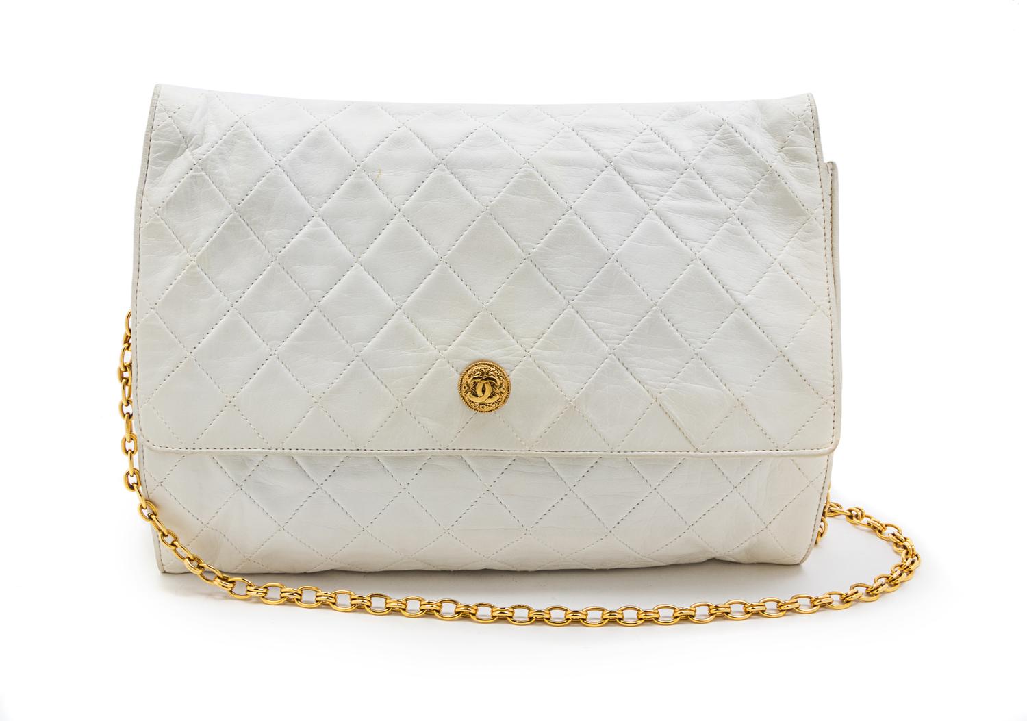 A Chanel White Quilted Leather Flap Bag, 11 1/2 x 9 x 1 1/2 inches.