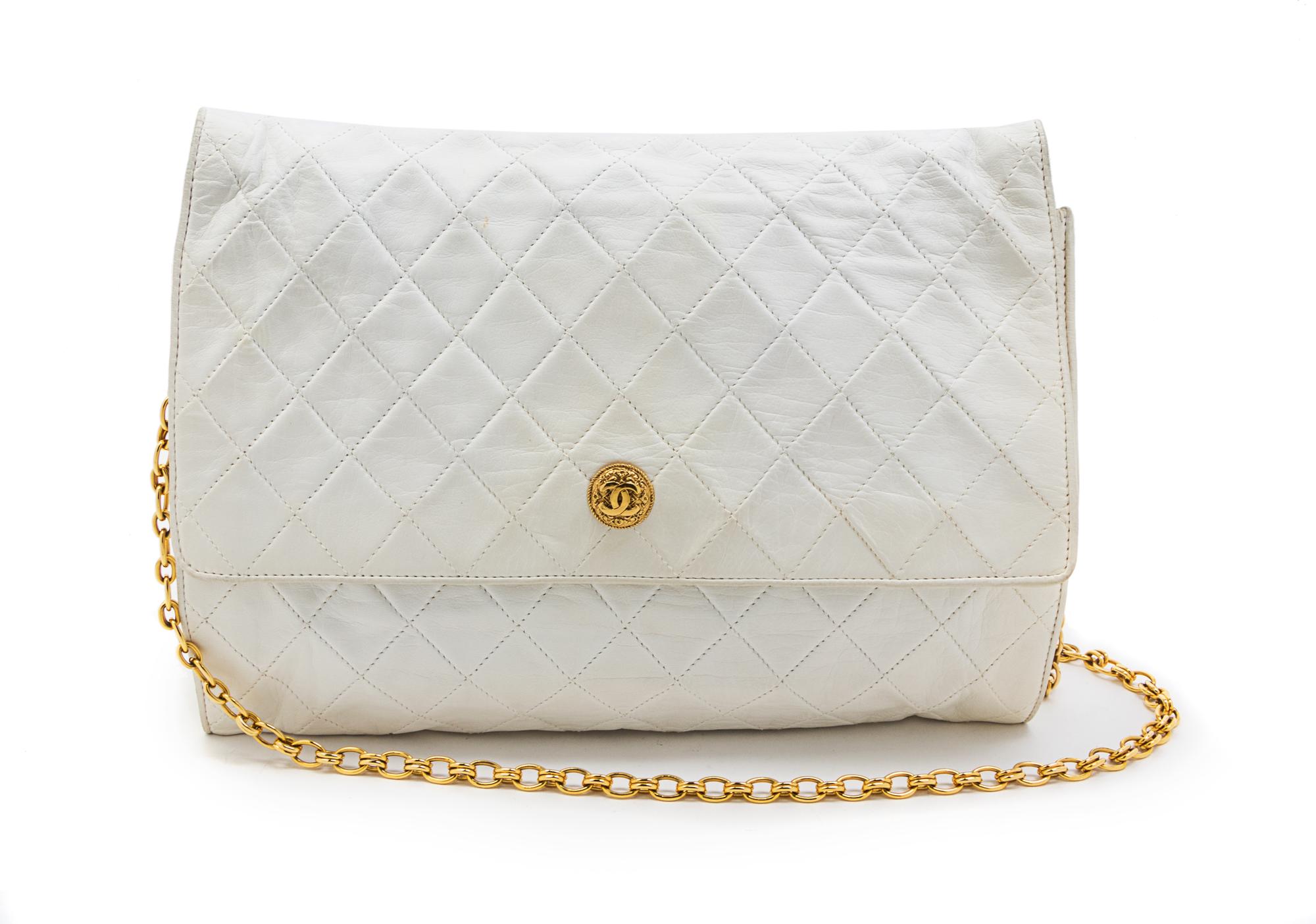 A Chanel White Quilted Leather Flap Bag, 11 1/2 x 9 x 1 1/2 inches.