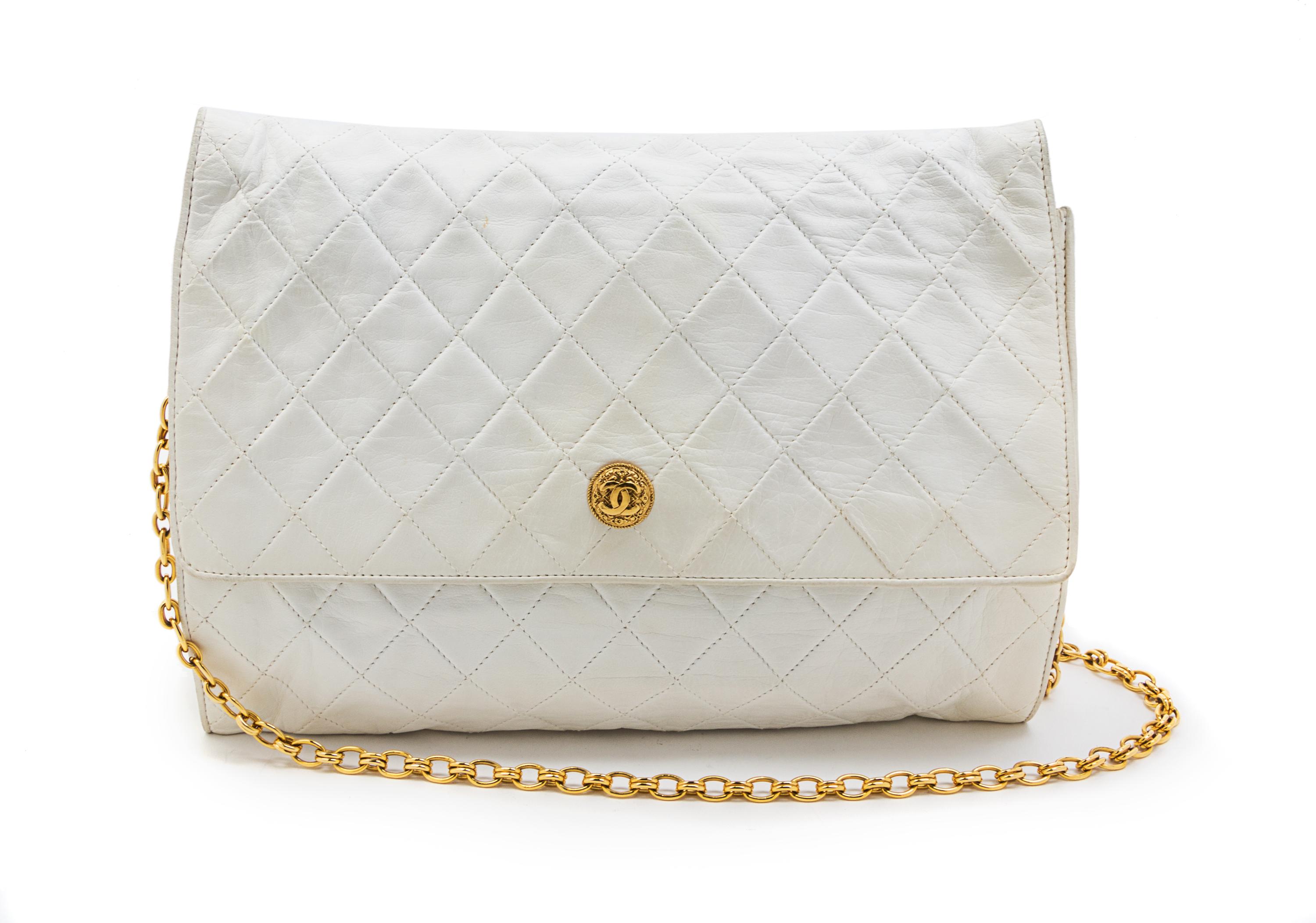 A Chanel White Quilted Leather Flap Bag, 11 1/2 x 9 x 1 1/2 inches.