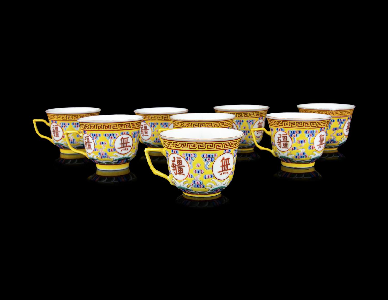 Eight Chinese Famille Jaune Porcelain Tea Cups
