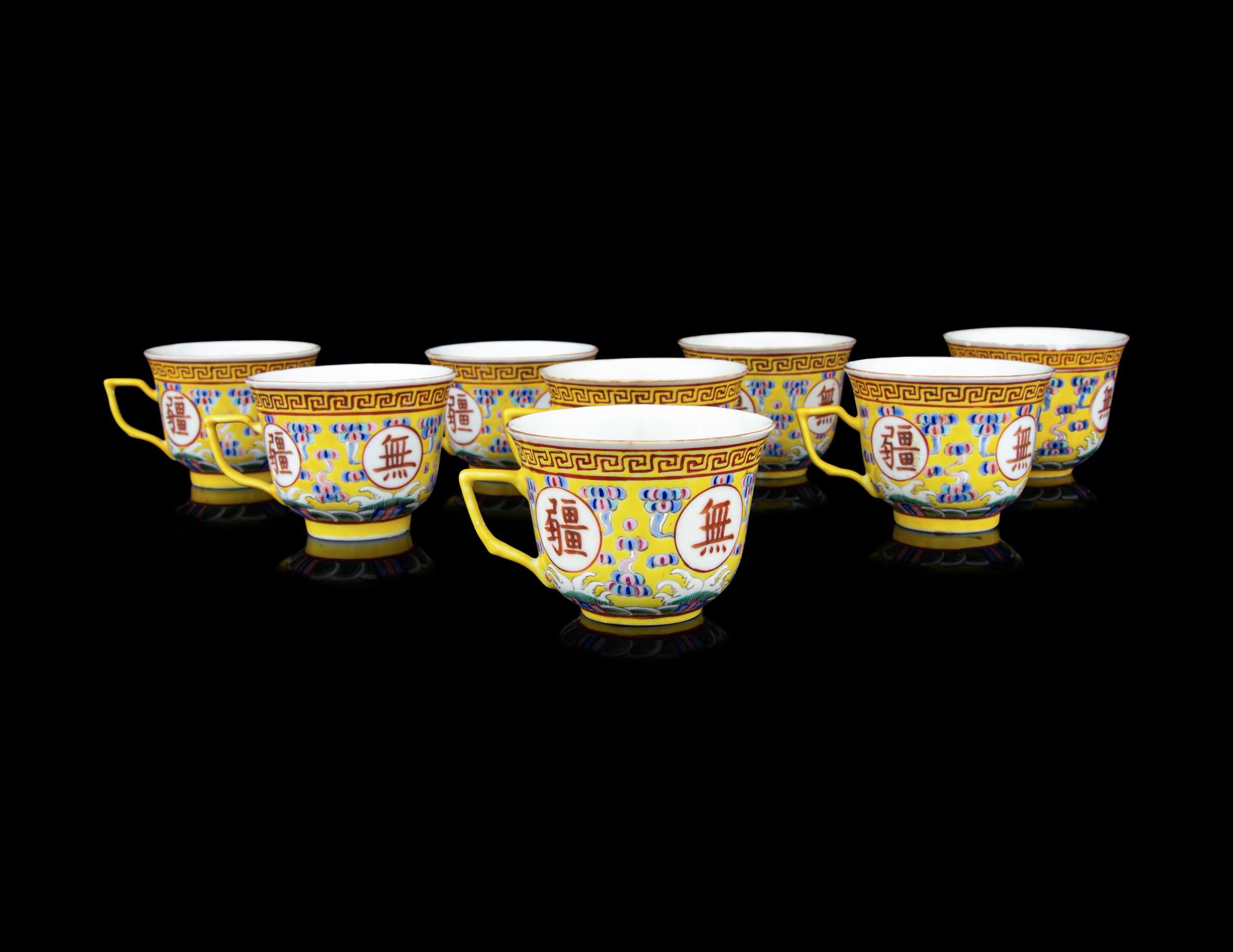 Eight Chinese Famille Jaune Porcelain Tea Cups