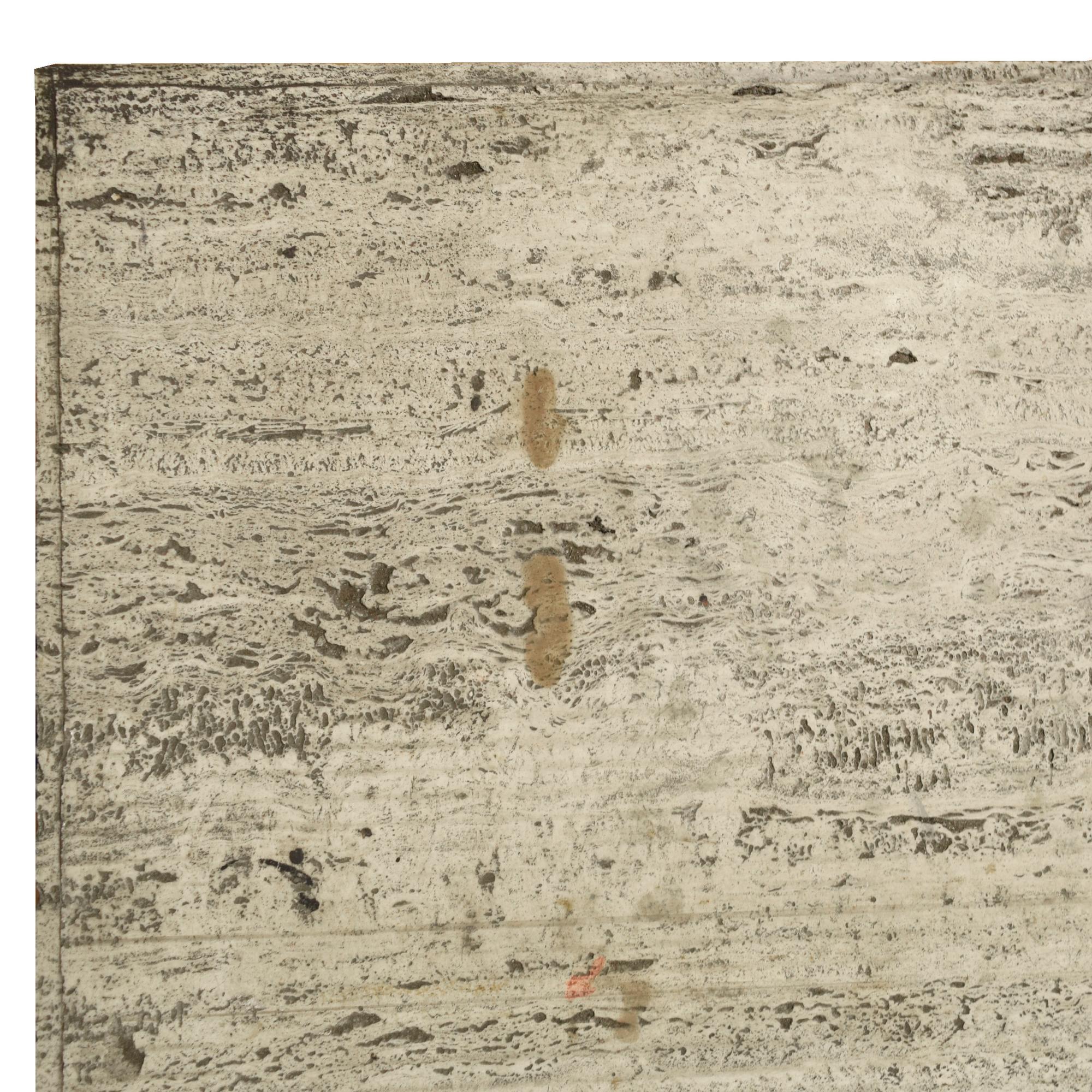 An Iron and Lead Travertine Top Table 47.5" W x 23.5 "d x 29.5" H — France, Circa 1930