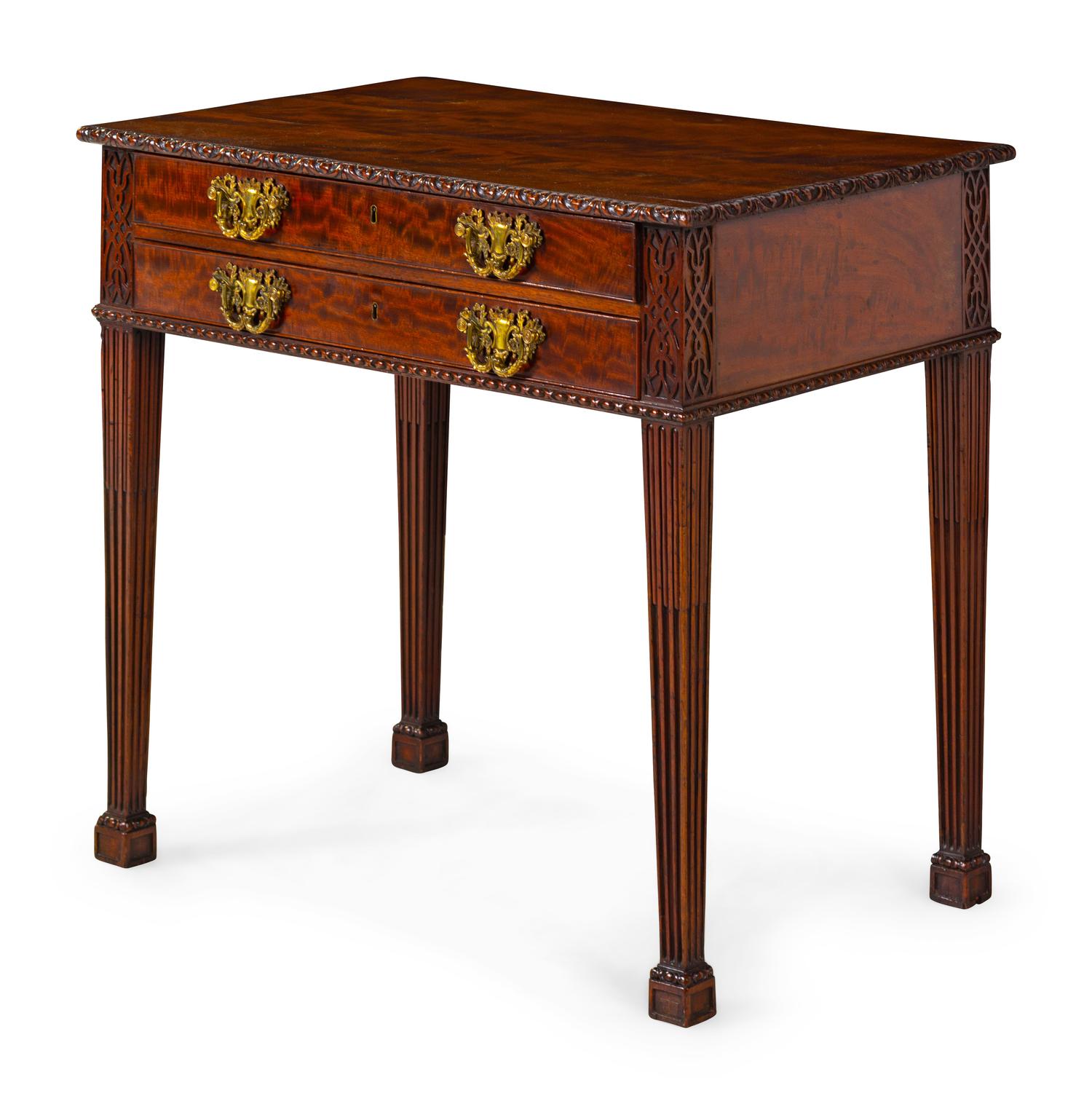 A George III Carved Mahogany Writing Table