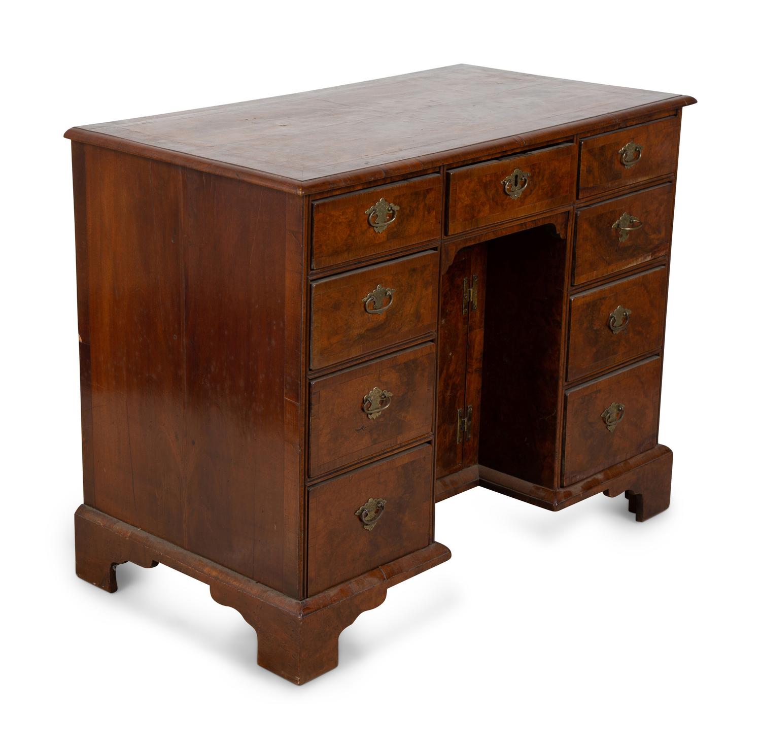 A George II Style Burl Walnut Kneehole Desk — 19TH CENTURY