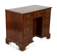 A George II Style Burl Walnut Kneehole Desk — 19TH CENTURY