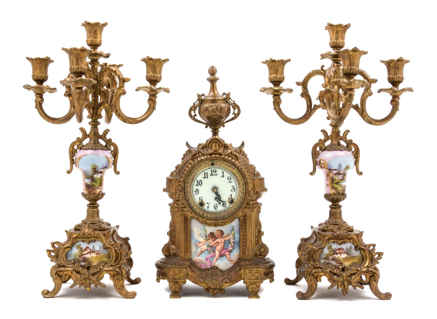 A Sevres Style Porcelain Mounted Gilt Bronze Clock Garniture Height of candelabra 18 inches. — 20TH CENTURY