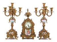 A Sevres Style Porcelain Mounted Gilt Bronze Clock Garniture Height of candelabra 18 inches. — 20TH CENTURY