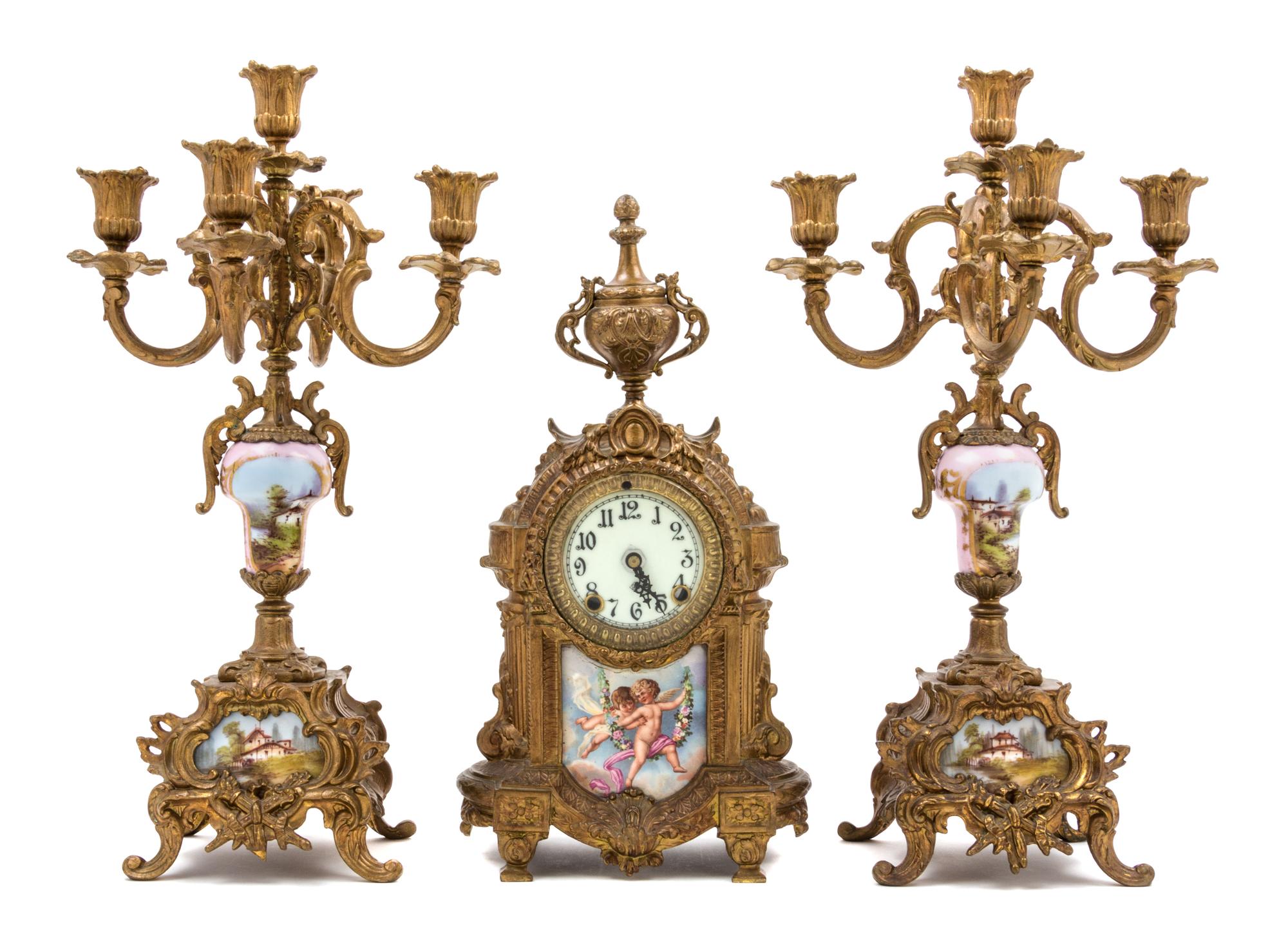 A Sevres Style Porcelain Mounted Gilt Bronze Clock Garniture Height of candelabra 18 inches. — 20TH CENTURY