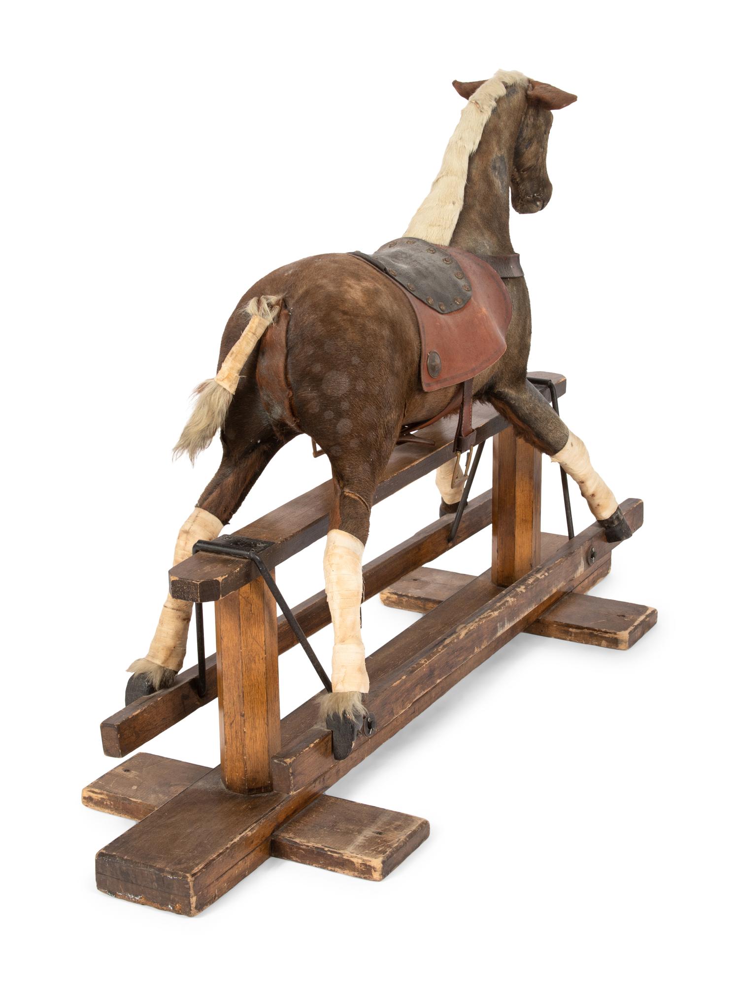 A Child's Horse Hair Upholstered Riding Toy