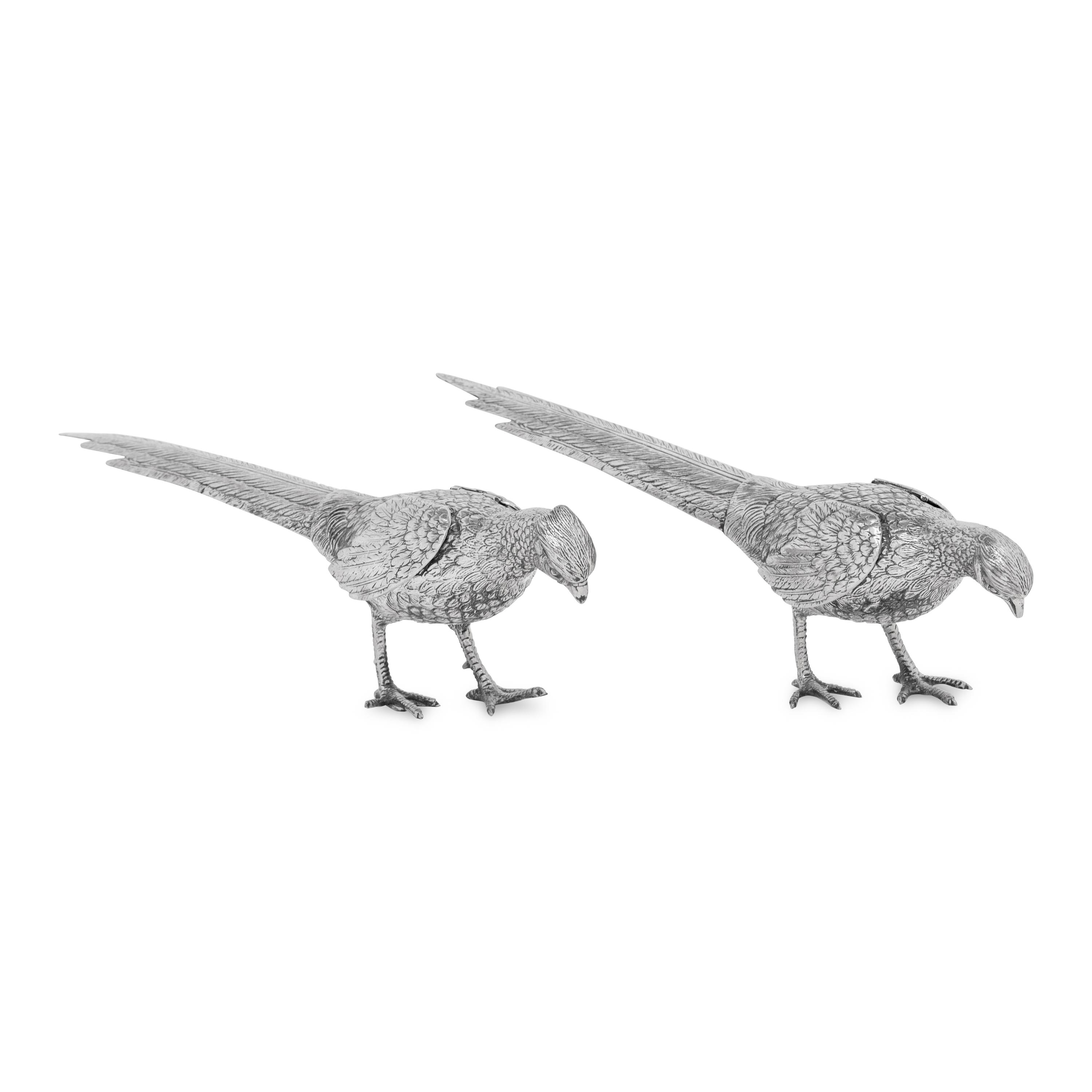 A Pair of Spanish Silver Models of Pheasants