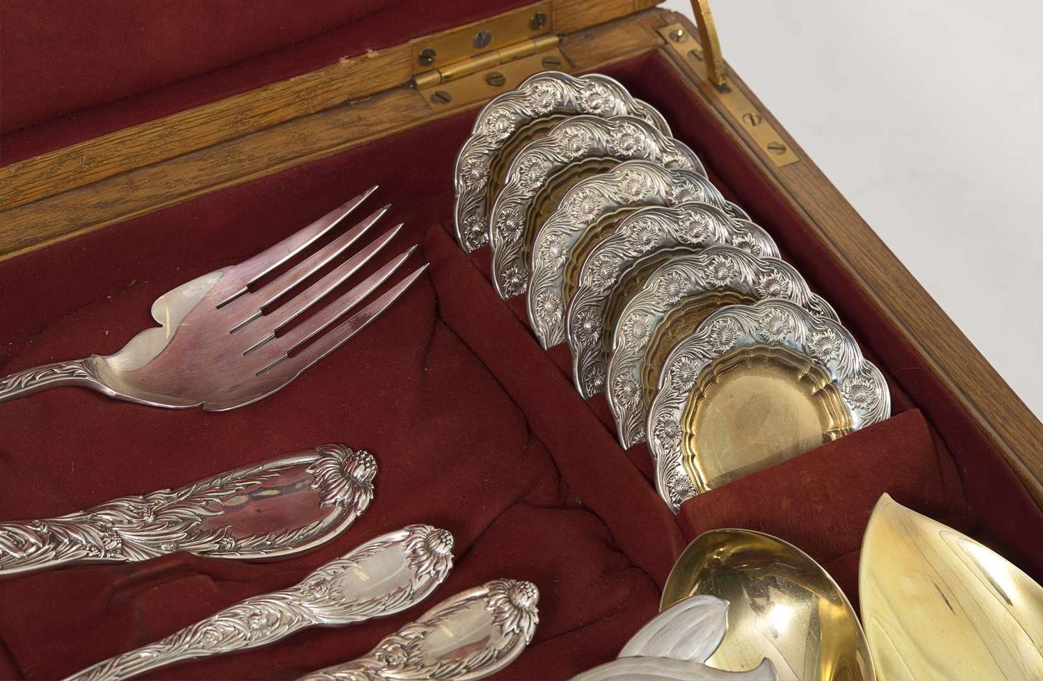 An extensive sterling silver flatware service for twelve in the "Indian Chrysanthemum" pattern, designed by Charles T. Grosjean, Tiffany & Co., New York, NY, circa 1880-1891
