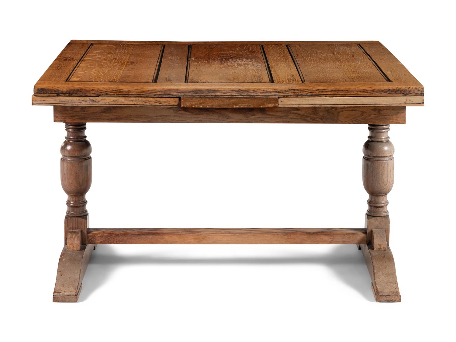 An English Arts and Crafts Oak Extension Dining Table