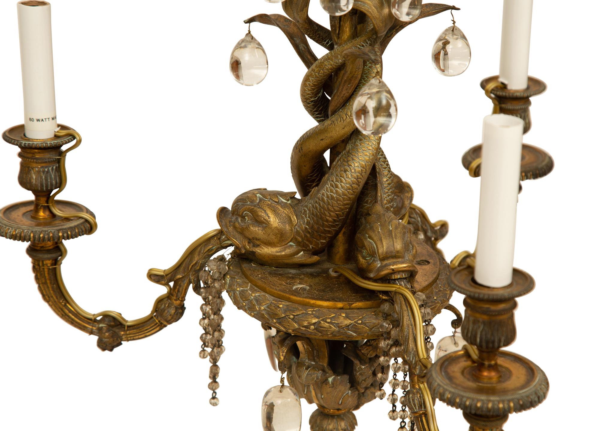 A French Gilt Bronze Three-Light Dolphin Chandelier