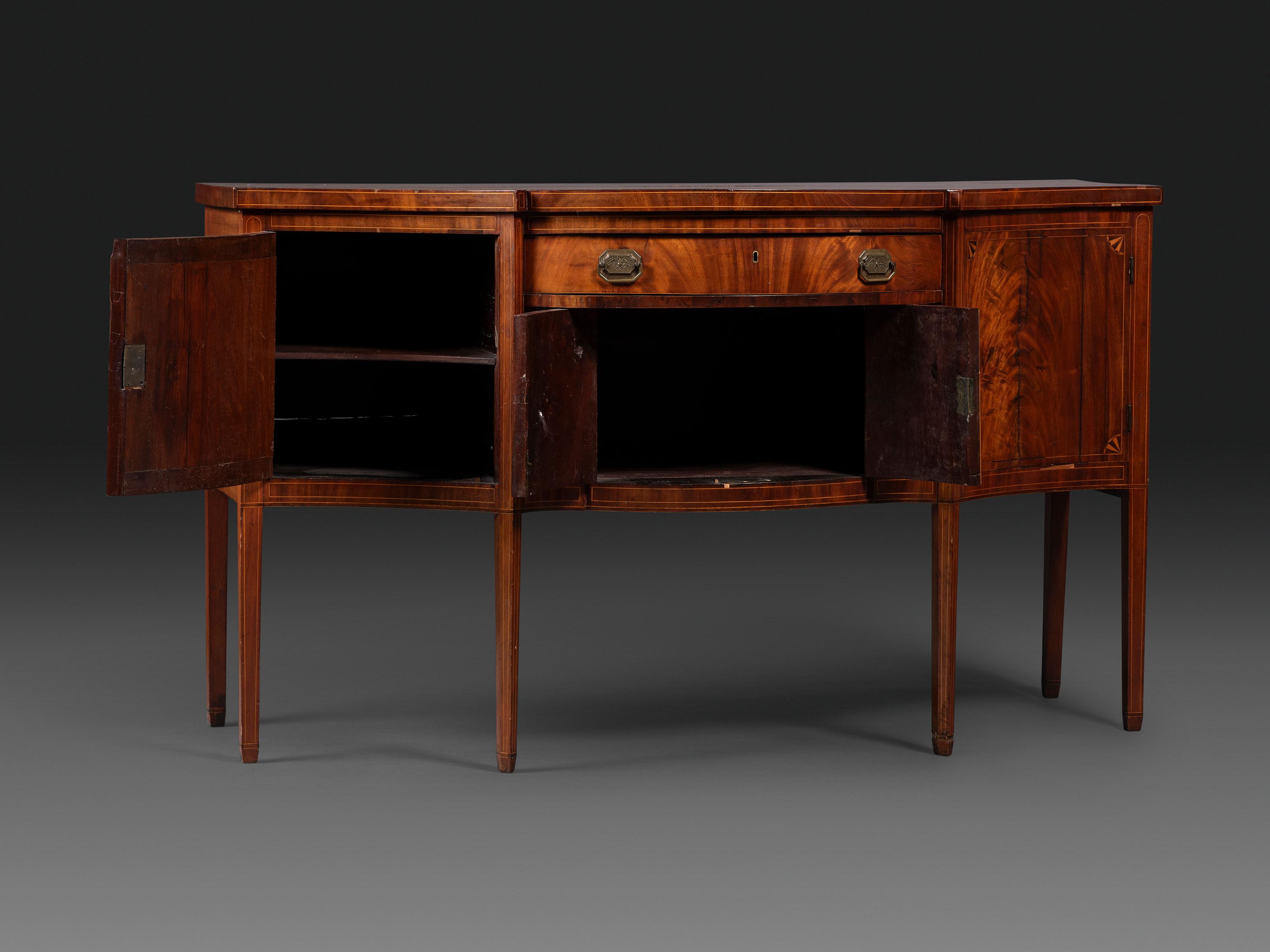 A Federal Fan-Inlaid and Figured Mahogany Serpentine Sideboard