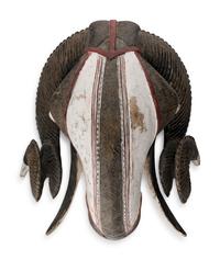 An African Carved and Painted Wood Ram's Head
