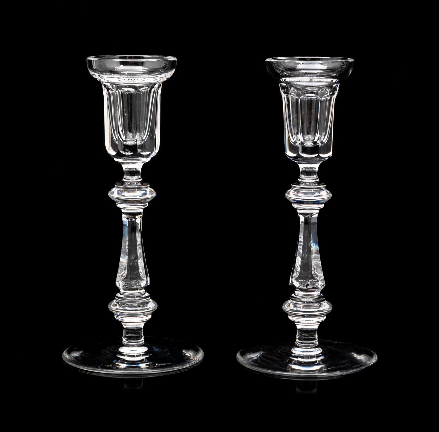A Pair of Waterford Candlesticks Height 8 1/4 inches.