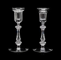 A Pair of Waterford Candlesticks Height 8 1/4 inches.