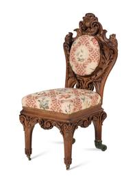 A Set of Six Rococo Revival Carved Oak Dining Chairs