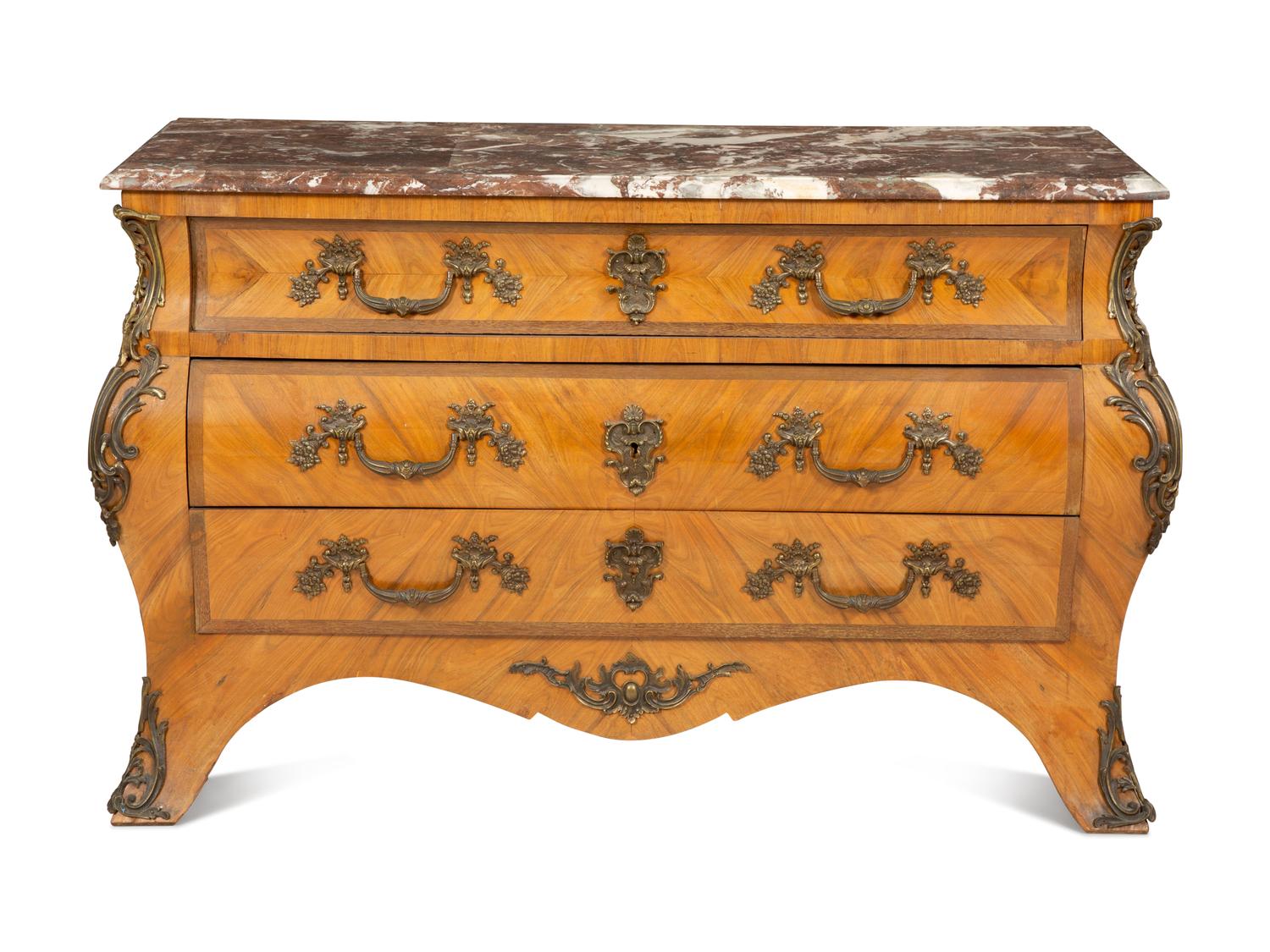 A Louis XV Style Gilt Bronze Mounted Marble-Top Bombe Commode