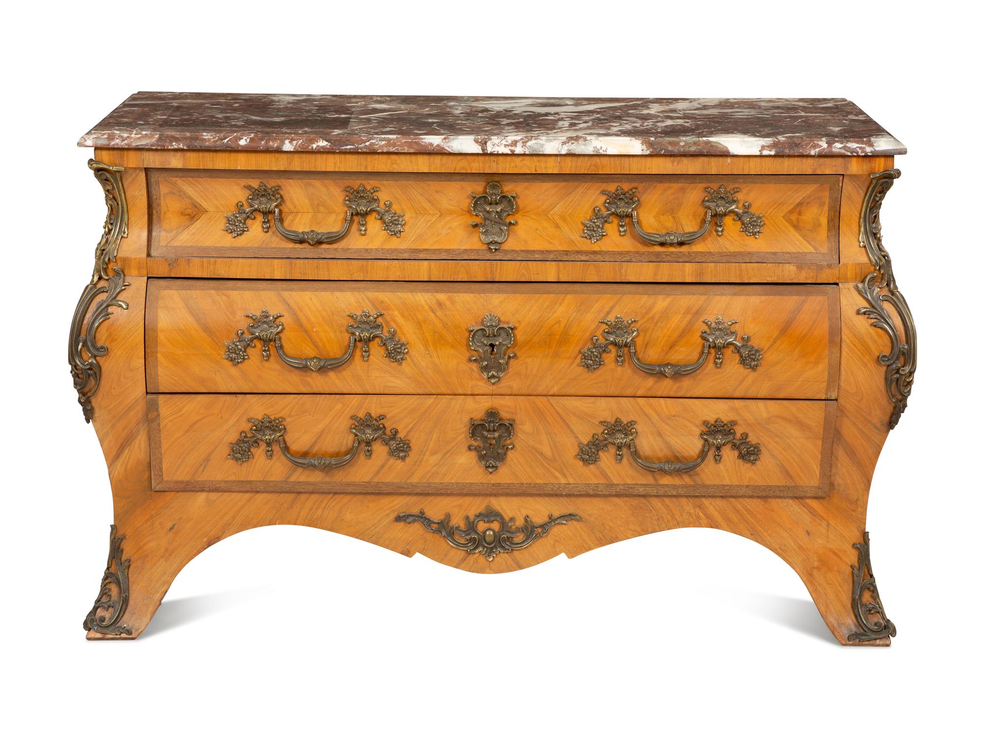 A Louis XV Style Gilt Bronze Mounted Marble-Top Bombe Commode