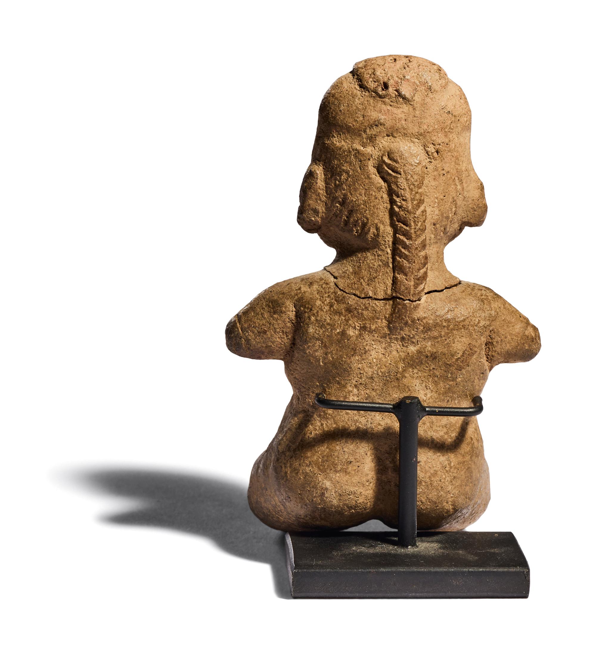 An Olmec Terracotta Seated Infant