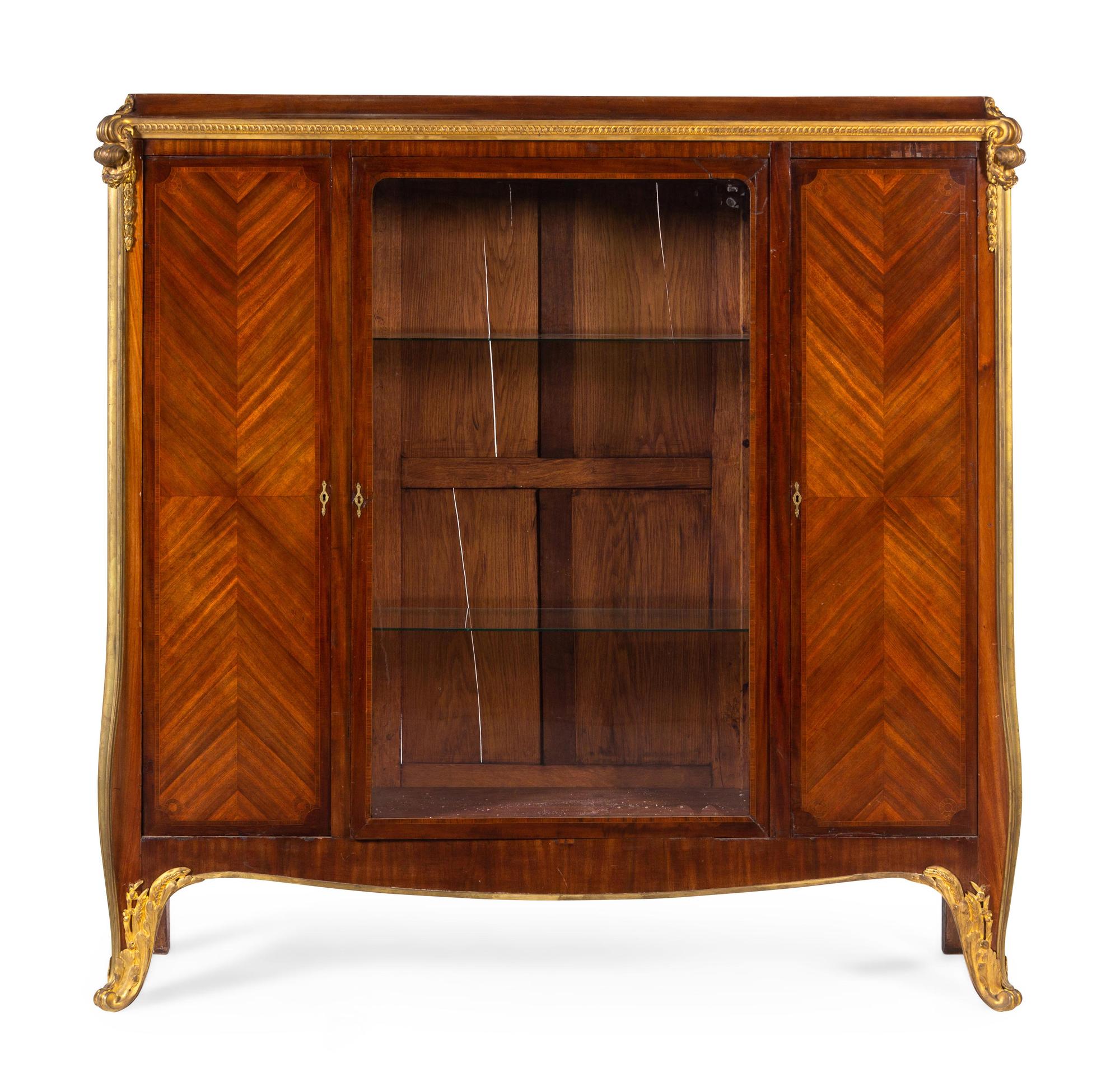 A Louis XV Style Gilt Bronze Mounted Mahogany Veneered Vitrine