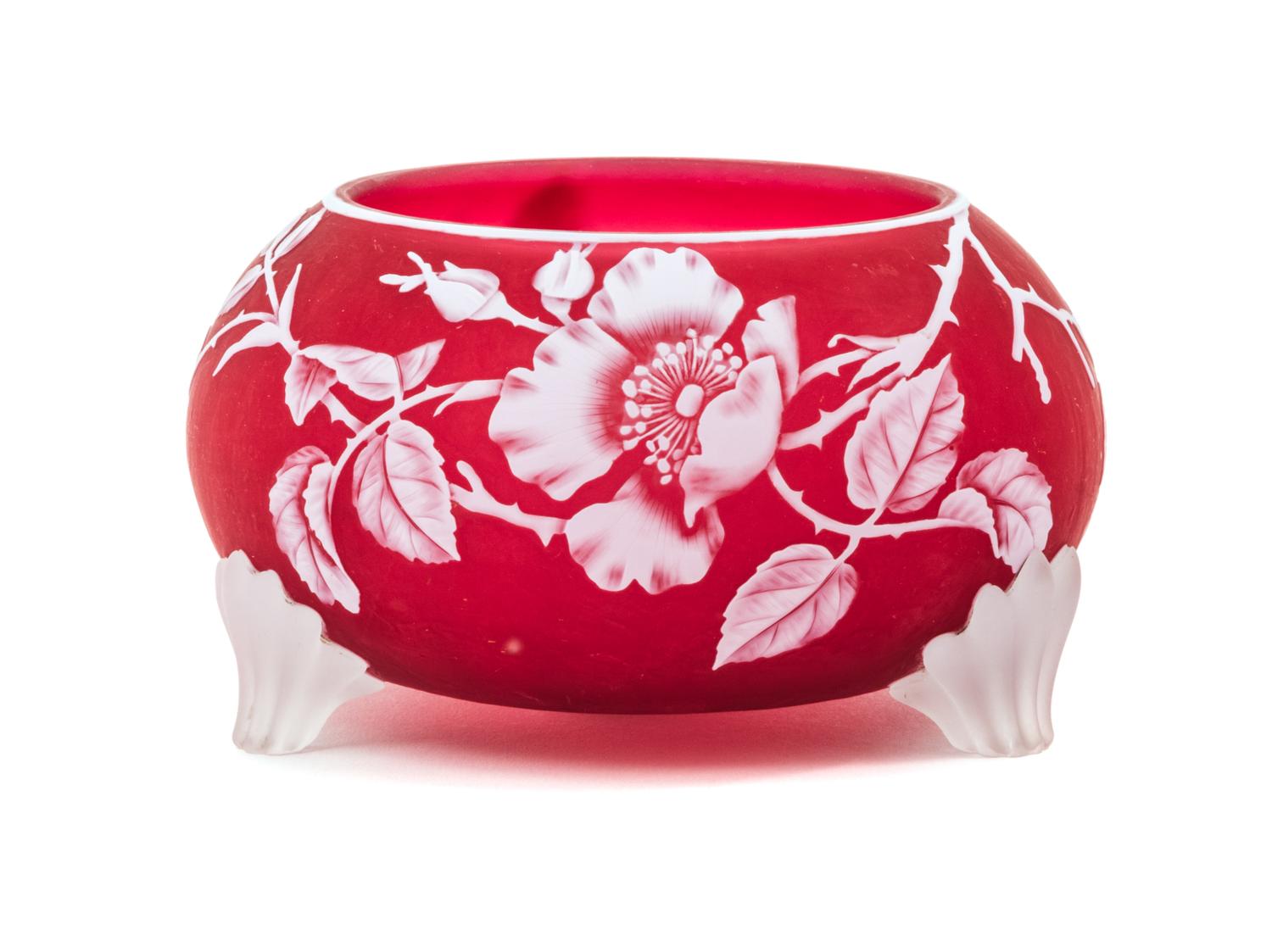 English, LATE 19TH CENTURY, a cameo glass footed bowl, of low form with rose and butterfly decoration, have three applied frosted feet