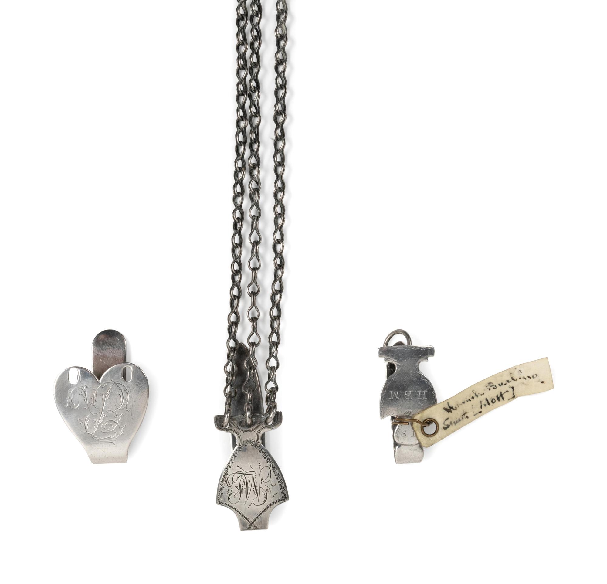 A Group of Three Silver Chatelaine Belt Clips