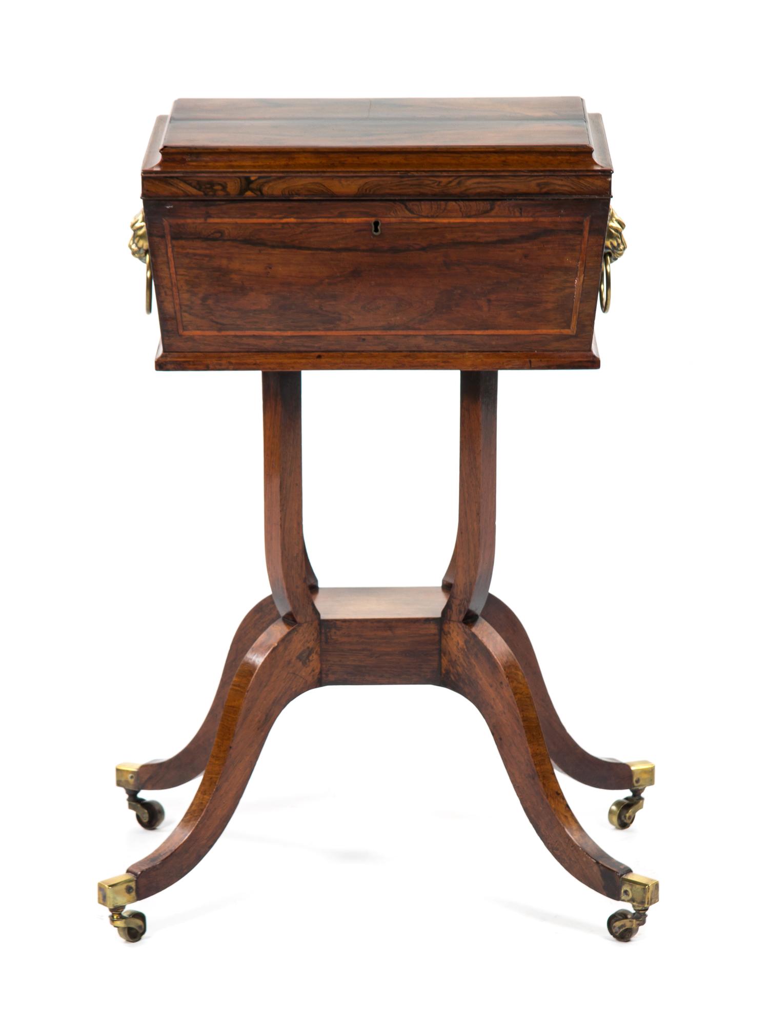 A Regency Rosewood Tea Poy, Height 30 x width 17 x depth 11 3/4 inches.