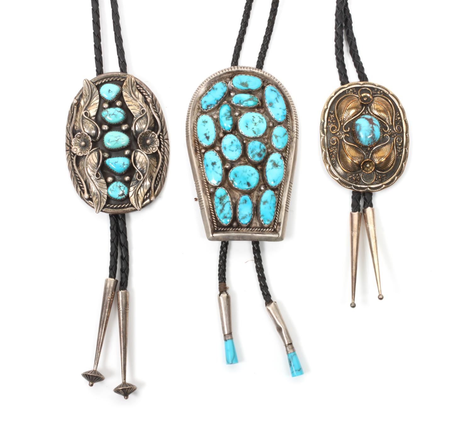 Three Silver and Turquoise Navajo Bolos Height of largest 3 1/2 x 2 1/4 inches.