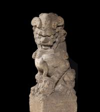 A Pair of Large Carved Stone Figures of Fu Lions