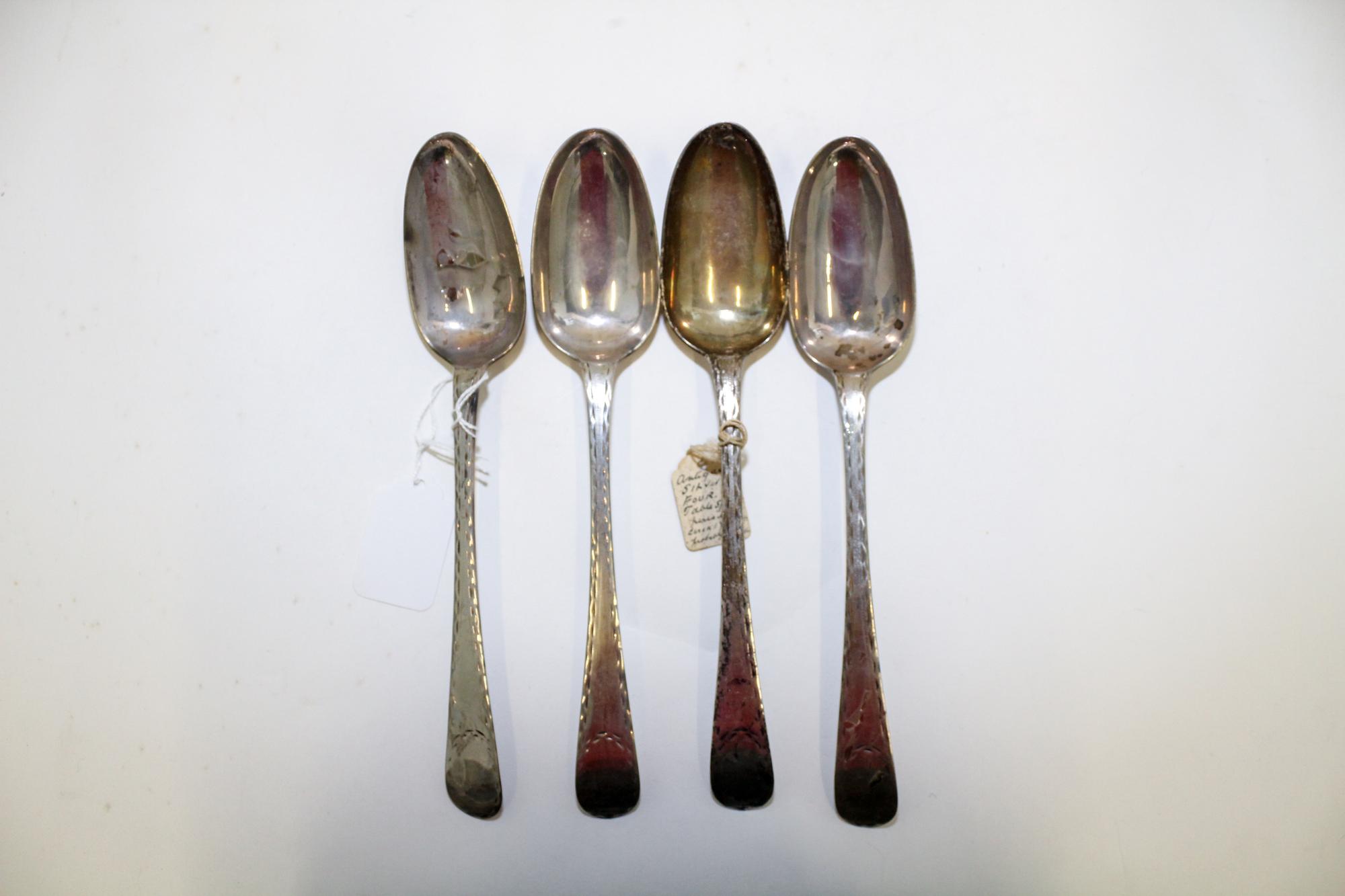 A Set of Four Silver Table Spoons, Makers mark V&C, late 19th century, the handles with bright-cut geometric decoration.