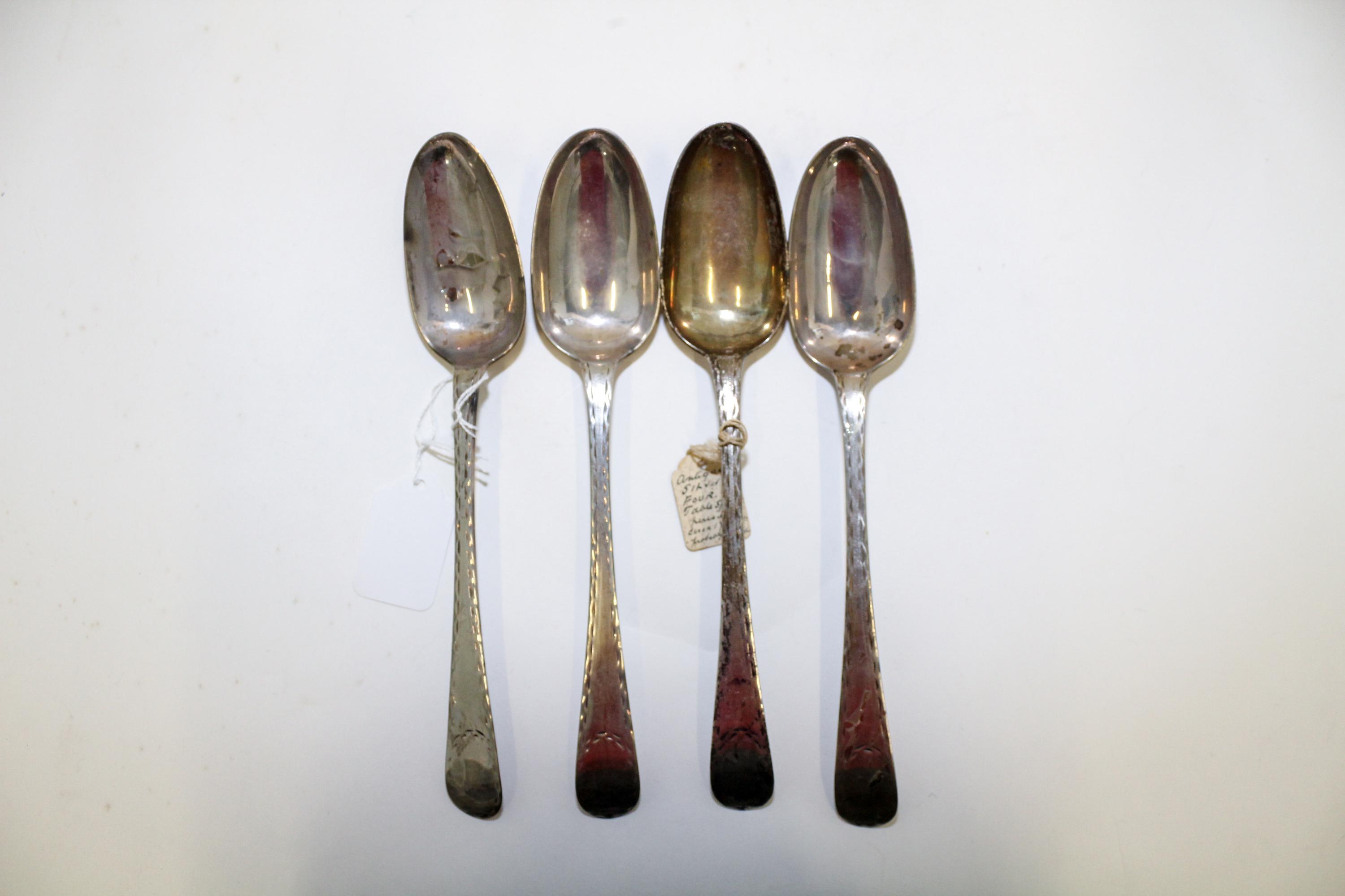 A Set of Four Silver Table Spoons, Makers mark V&C, late 19th century, the handles with bright-cut geometric decoration.