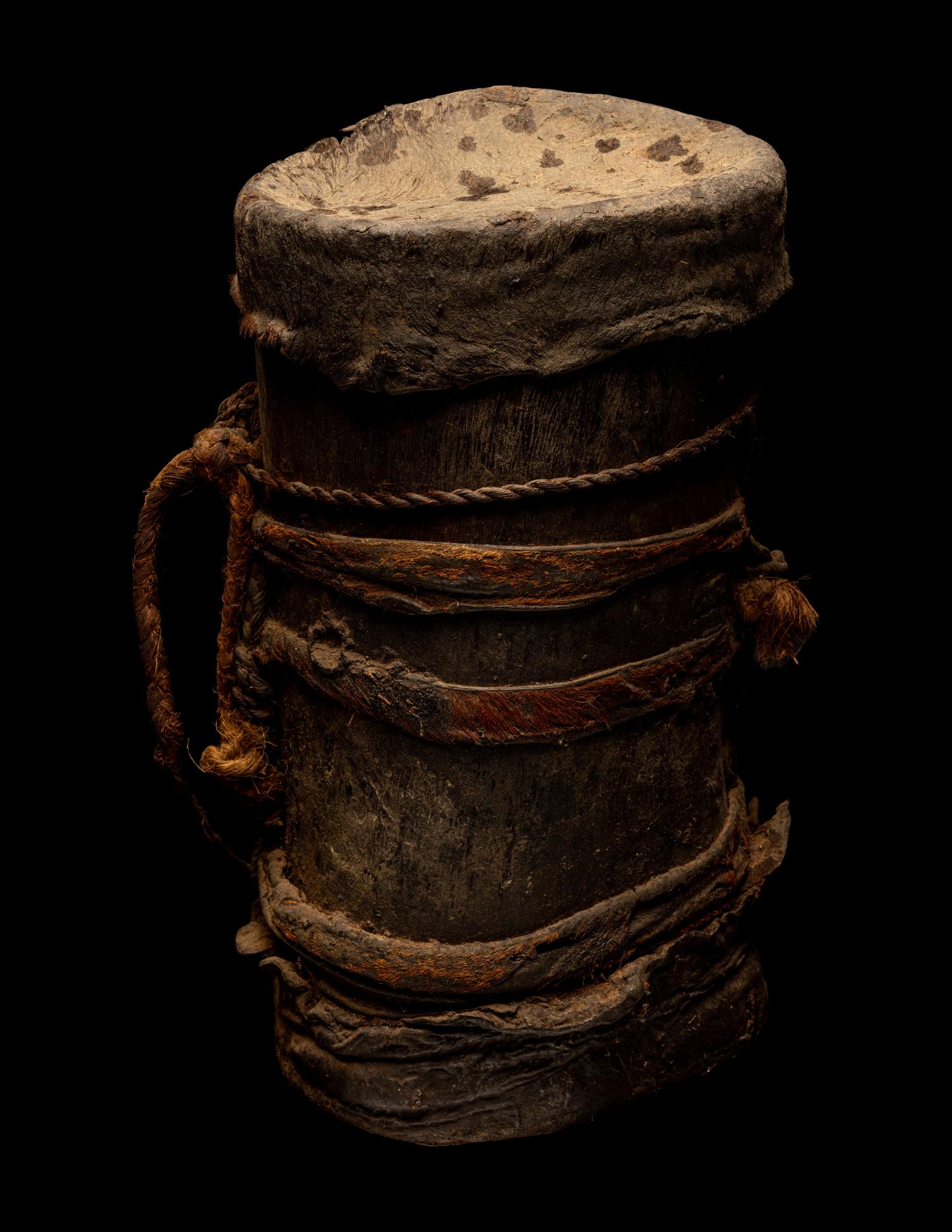 Eleven Oceanic and African Drums, Baskets, and Tools