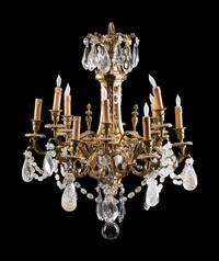 A Gilt-Bronze, Rock Crystal and Glass Twelve-Light Chandelier